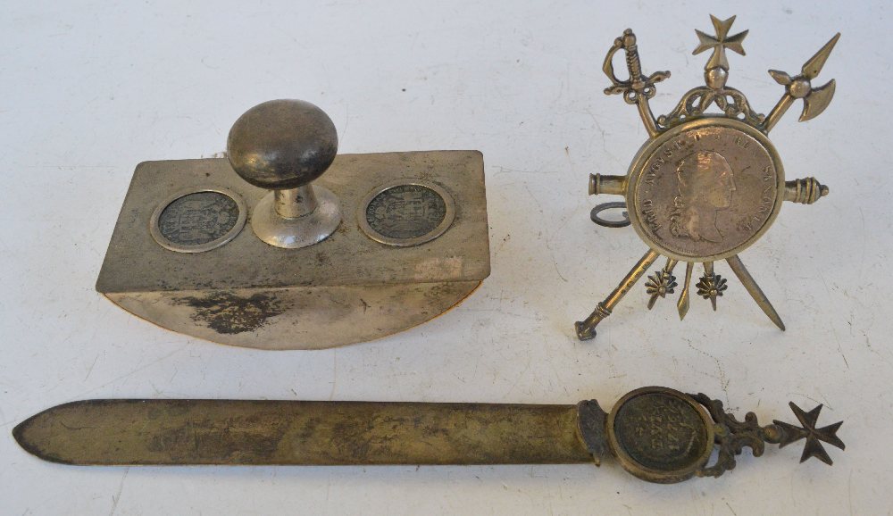 Silver blotter with inset coins and name tag holder with coin, and paper knife