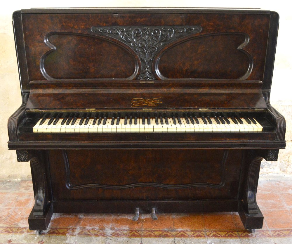 CARL WAGNER iron frame upright piano in walnut case