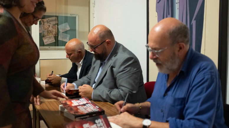 John Sweeney (right) with co-authors Carlo Bonini (left) and Manuel Delia (centre)