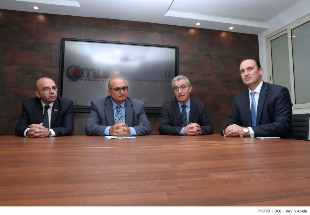 MUT President Marco Bonnici (left) with Education Minister Evarist Bartolo (second from right)