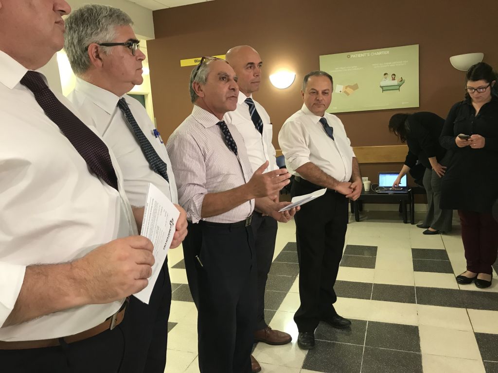 Prof. Michael Borg (right) and other health experts deliver a press conference 