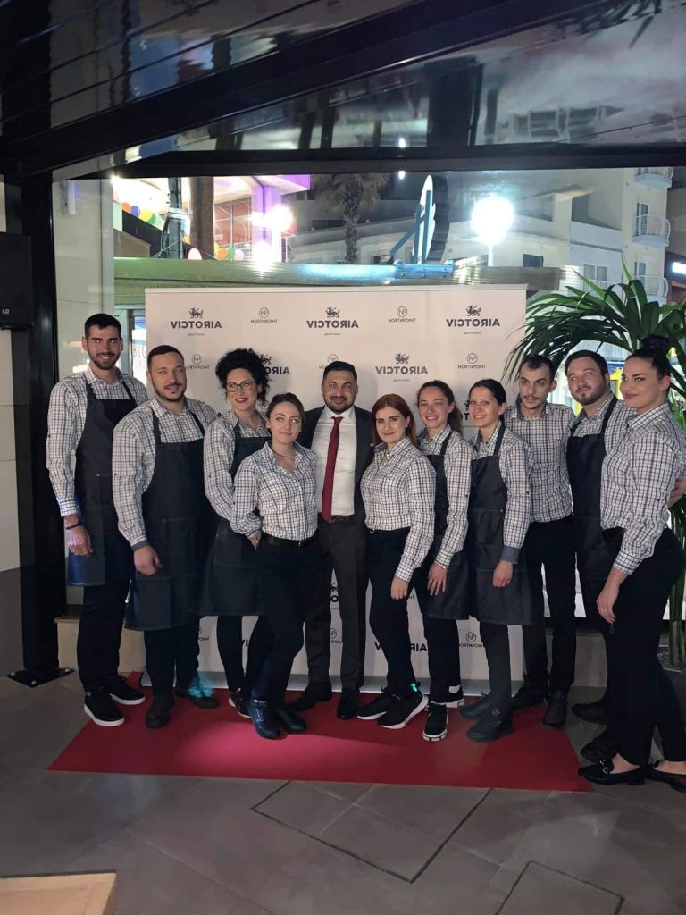 Alan Bugeja (centre) with his staff at the opening of the Victoria Gastropub 