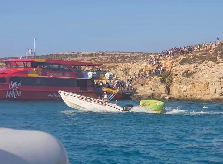 Crowds gather at the Blue Lagoon, Comino yesterday 