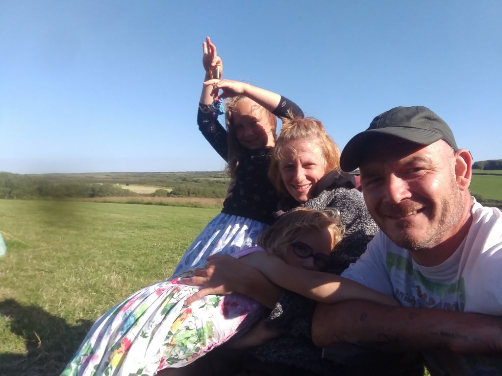 Daniel, his wife Marzena, and his two daughters 