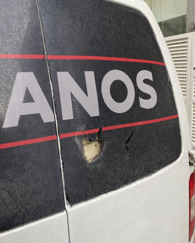 The window of the company's delivery van was also damaged 