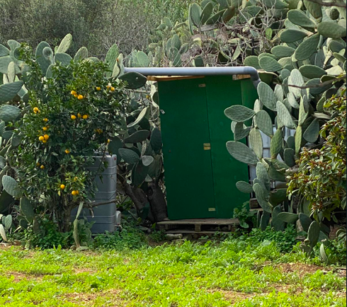 A makeshift structure in the neighbouring field 