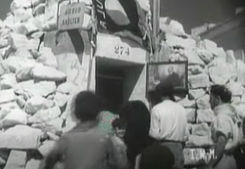 People entering an air raid shelter