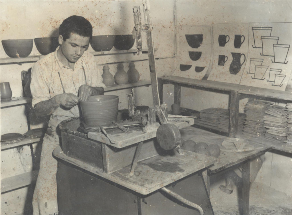 A man working at the pottery factory in the 1950s