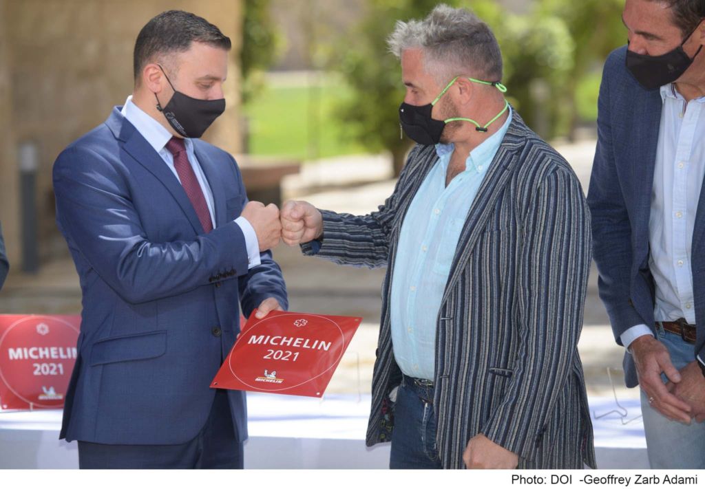 ION - The Harbour founder Mark Weingard (right) receiving a Michelin Star from Tourism Minister Clayton Bartolo (Photo: ION - The Harbour)