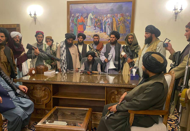 Taliban fighters take control of Afghan presidential palace in Kabul. 