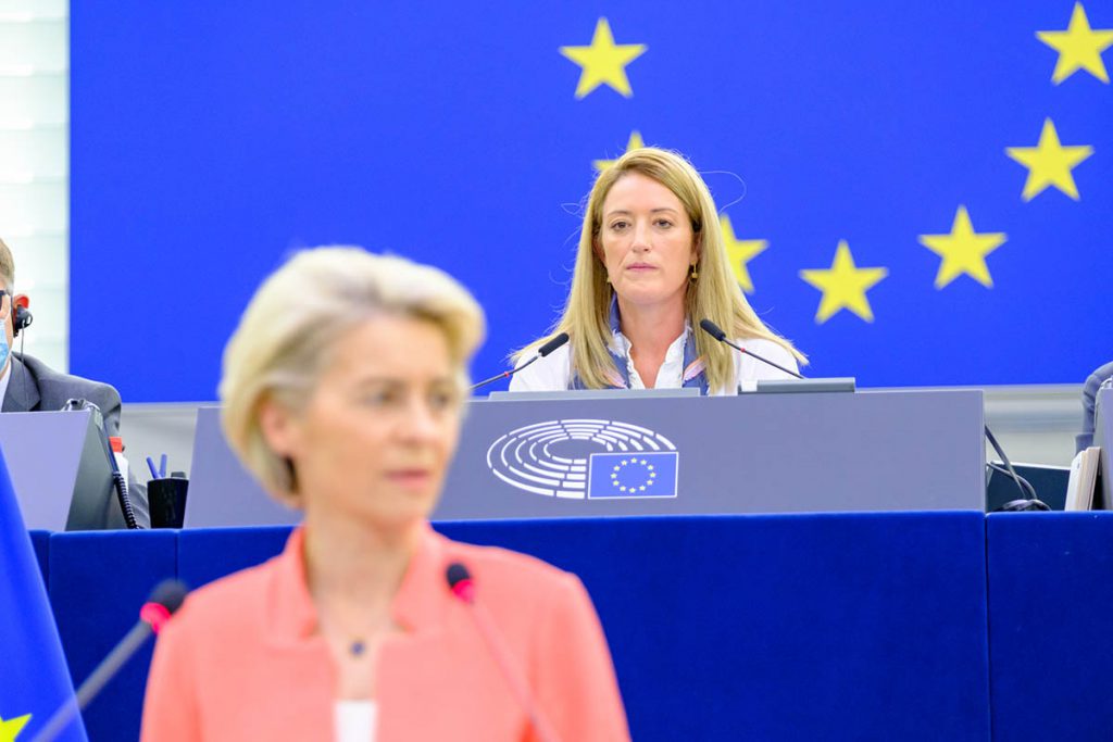 Roberta Metsola takes a seat behind European Commission president Ursula von der Leyen