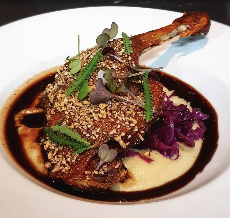 onfit Duck leg with a honey & hazelnut Dukkah glaze, Pommes pure and Red Cabbage agrodolce