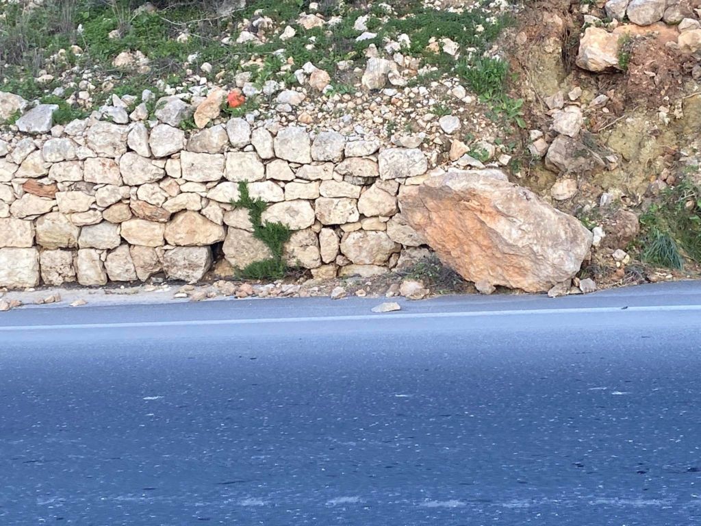 Rocks pushed to the side of the road 