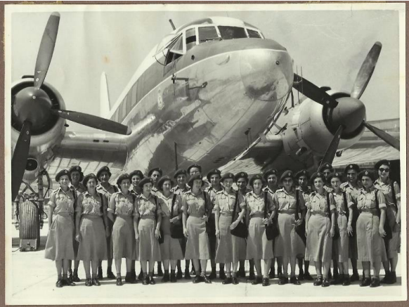 Rita Vella (Left, 2nd front row) among her volunteer colleagues