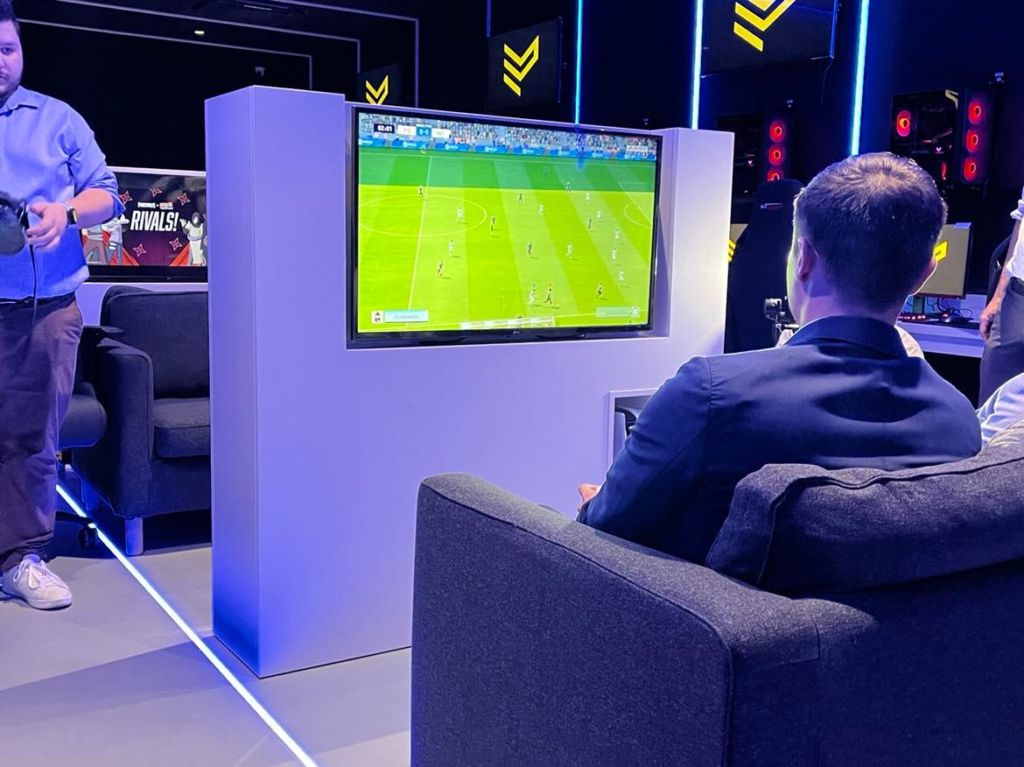 Silvio Schembri trying his hand out at FIFA at the new Esports hub at the Plaza Shopping Centre 