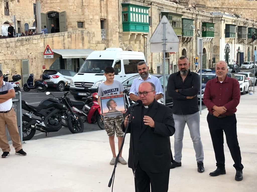 Archbishop Charles Scicluna speaks at a vigil in honour of Loujin yesterday afternoon