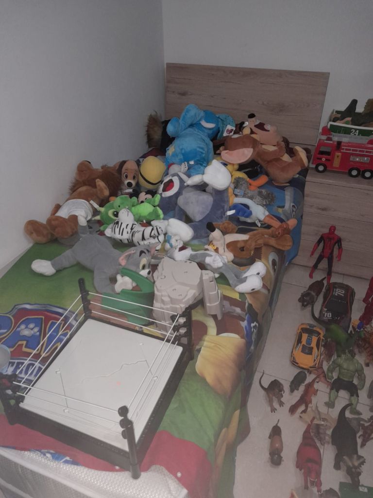 Kane Debattista's bed with some presents his parents bought him