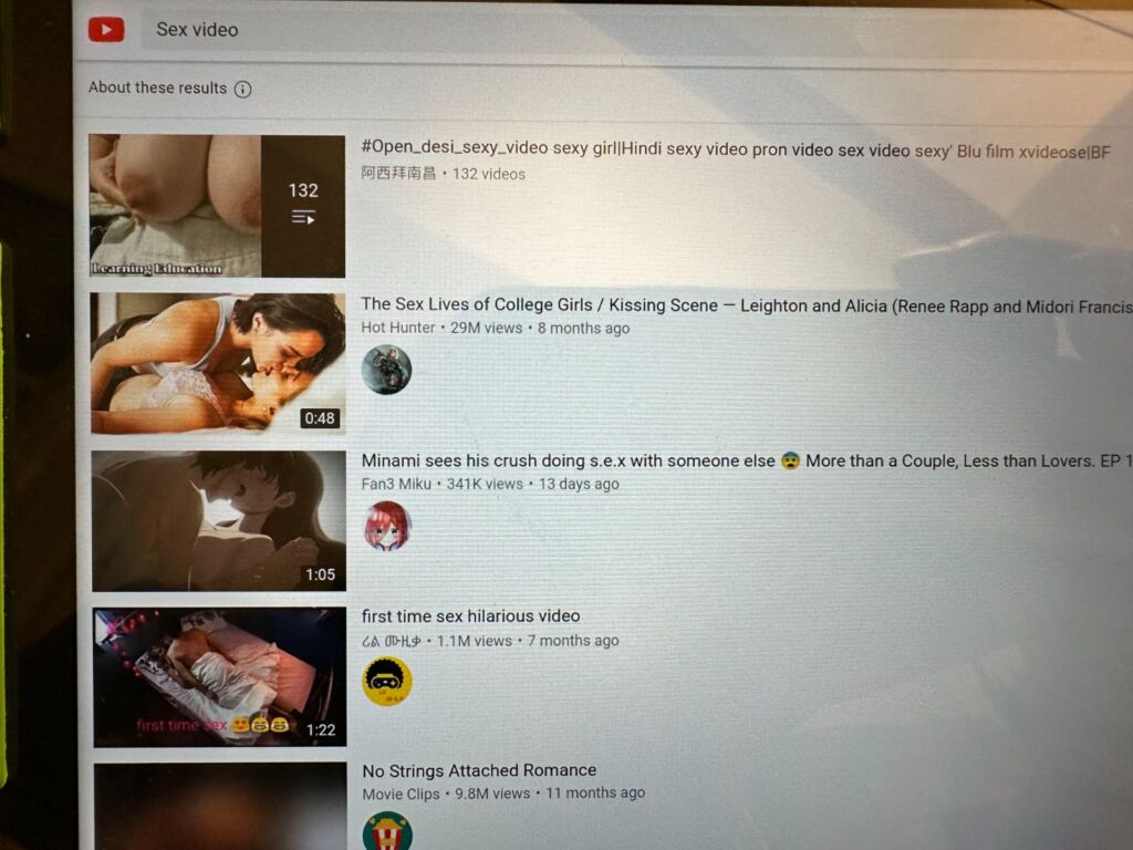 A YouTube search for 'sex video' on a LearnPad device