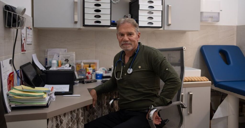 Portrait of Dr Joseph Tonna in his clinic. Dr Tonna has been a family doctor in the area for decades, and has noticed an increase in asthma over the past few years.