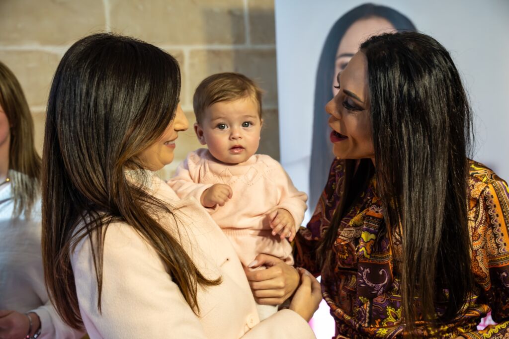 Claudette Abela Baldacchino with independent MP Rosianne Cutajar and her baby at a campaign event