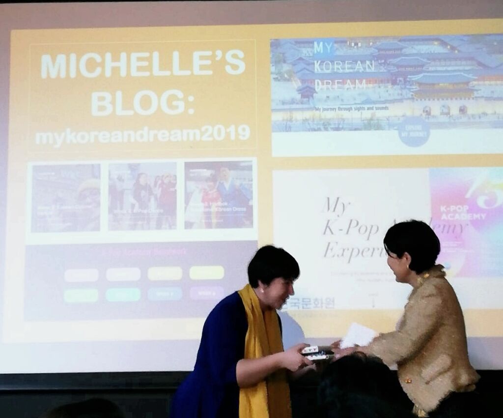 Michelle being awarded the Best Social Media Award by South Korean Ambassador to the UK, Enna Park