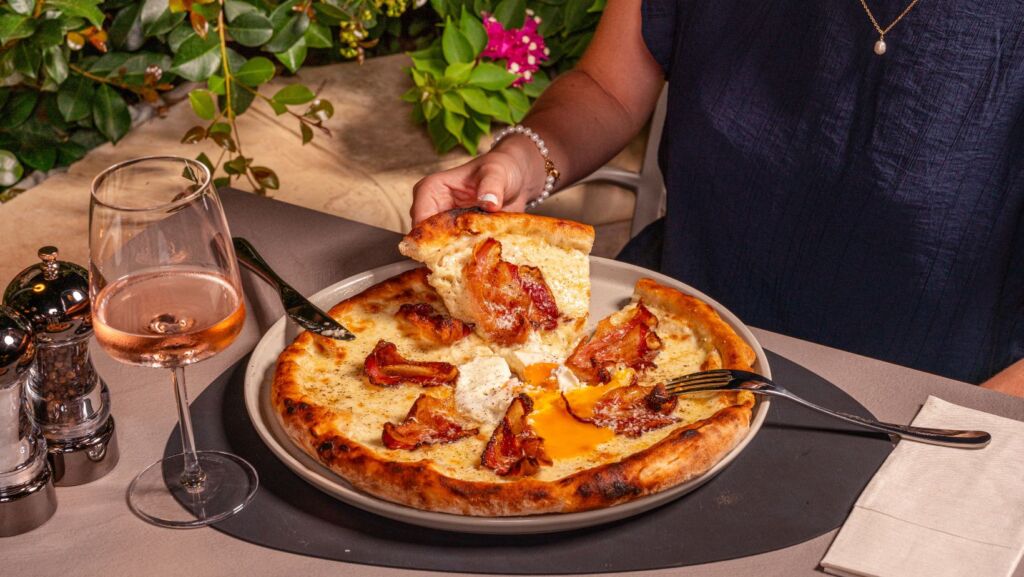 Straight from the wood-fired oven and irresistibly crisp; the Carbonara Pizza