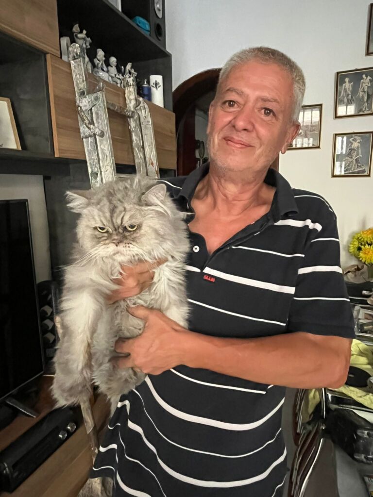 Peter with Prince, who managed to survive the fire